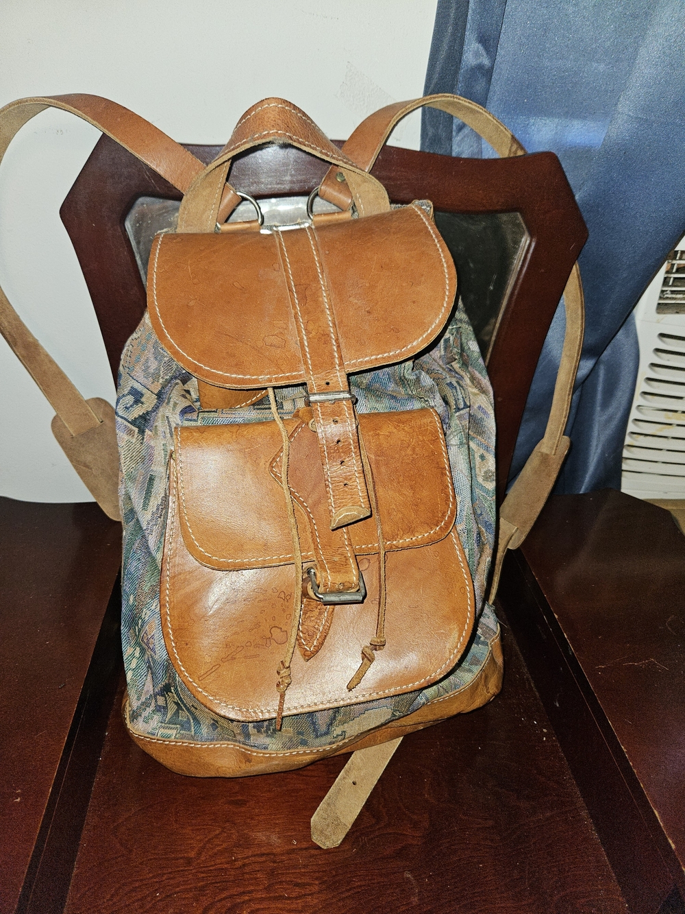 handmade Moroccan backpack features brown leather combined with woven kilim rug